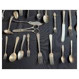 Large Lot of Assorted Vintage Flatware Including Spoons, Forks, and Knives