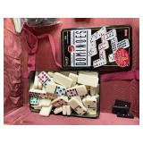 Vintage Game Collection with Domino Sets, Scrabble, and Chinese Checkers Marbles in Suitcase