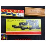 Vintage Game Collection with Domino Sets, Scrabble, and Chinese Checkers Marbles in Suitcase