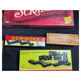 Vintage Game Collection with Domino Sets, Scrabble, and Chinese Checkers Marbles in Suitcase