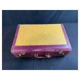 Vintage Game Collection with Domino Sets, Scrabble, and Chinese Checkers Marbles in Suitcase