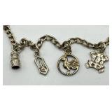 Vintage Silver-Tone Charm Bracelet with 8 Unique Charms