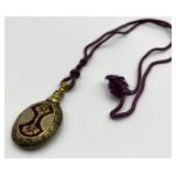 Ornate Brass Perfume Flask with Decorative Cord