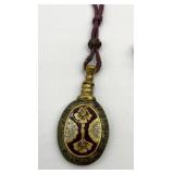 Ornate Brass Perfume Flask with Decorative Cord