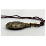 Ornate Brass Perfume Flask with Decorative Cord