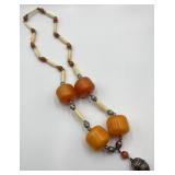 Large Butterscotch Amber Color Beads and Silver Bell Pendant