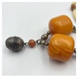 Large Butterscotch Amber Color Beads and Silver Bell Pendant