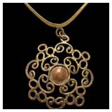 Gold-Tone Filigree Pendant Necklace with Copper Cabochon Center