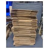 Stack of Uline 6x4x4 Corrugated Shipping Boxes S-4060