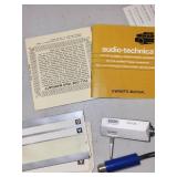 Turntable Accessory Lot Including Headshell, Fuses, Manuals, and Audio-Technica AT15S/LC Box