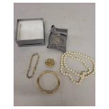 Vintage Jewelry Collection with Pearl Necklace, Gold-Tone Bracelet, Chain Bracelet, and Brooch