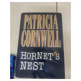 Collection of 9 Books and Notebook Including Cornwell, McCarthy, Dopesick, and More