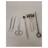 Collection of Vintage Dental Tools and Accessories