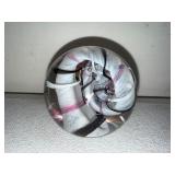 Signed Art Glass Paperweight with Swirled White, Black, and Pink Design