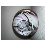 Signed Art Glass Paperweight with Swirled White, Black, and Pink Design