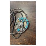 Sterling Hand Made Bolo tie with turquoise and bear claws!
