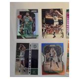 Lot of 15 Boston Celtics Basketball Cards Featuring Players like Kyrie Irving, Larry Bird, Jaylen Brown, Bill Russell and Others