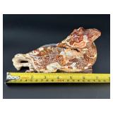 This Red Jasper dragon is a carved symbol of strength, courage, and grounding.