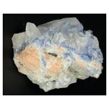 Blue Halite Crystal is a translucent cluster of soft blue cubic formations, exuding a calm, cooling energy.