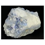 Blue Halite Crystal is a translucent cluster of soft blue cubic formations, exuding a calm, cooling energy.