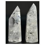 Two mesmerizing Crackle Quartz tower, its interior fractured patterns catching the light likefrozen lightning.