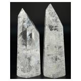 Two mesmerizing Crackle Quartz tower, its interior fractured patterns catching the light likefrozen lightning.