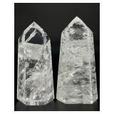 Two mesmerizing Crackle Quartz tower, its interior fractured patterns catching the light likefrozen lightning.