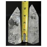 Two mesmerizing Crackle Quartz tower, its interior fractured patterns catching the light likefrozen lightning.