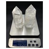 Two mesmerizing Crackle Quartz tower, its interior fractured patterns catching the light likefrozen lightning.