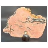 A stunning extra-large pink amethyst slice, glowing with soft rosy hues and natural crystalline texture.