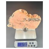 A stunning extra-large pink amethyst slice, glowing with soft rosy hues and natural crystalline texture.