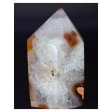 An Agate Druzy Tower is a striking crystal piece that blends the grounding beauty of agate with the sparkling magic of natural druzy formations.