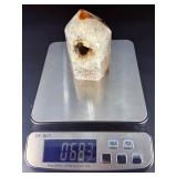 An Agate Druzy Tower is a striking crystal piece that blends the grounding beauty of agate with the sparkling magic of natural druzy formations.