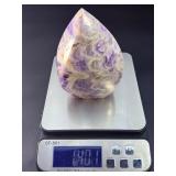 A Chevron Amethyst Freeform is a beautiful, naturally shaped crystal that features striking V-shaped banding of deep purple amethyst and milky white quartz. Also known as Dream Amethyst,