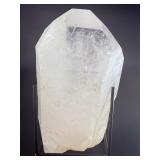 A Brazilian Clear Quartz Point is a powerful and timeless crystal. This naturally formed point features a polished or semi-polished body with a sharp, fully terminated tip, allowing energy to flow smo