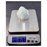 A Blue Raw Fluorite piece showcases the crystal in its natural, unpolished state, highlighting its geometric formations and soft to vibrant blue hues.