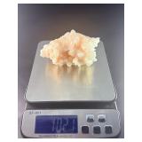 Peach Stilbite is a delicate and captivating crystal known for its soft, peachy-pink color and intricate, fan-like formations. Often found in clusters, the crystal’s radiating, layered structures ca