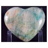 Quantum Quattro Heart is a striking, multi-faceted crystal heart that combines four powerful stones—typically Clear Quartz, Amethyst, Smoky Quartz, and Citrine—into one harmonious piece.