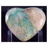 Quantum Quattro Heart is a striking, multi-faceted crystal heart that combines four powerful stones—typically Clear Quartz, Amethyst, Smoky Quartz, and Citrine—into one harmonious piece.