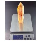 Carnelian Flower Agate Tower is a stunning hand-carved crystal that combines the vibrant, energizing hues of carnelian with the earthy, patterned beauty of flower agate.