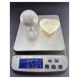 Quartz Sphere and Quartz Heart with Inclusions are captivating crystal pieces that showcase the natural beauty and energetic depth of quartz.