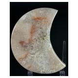 Pink Druzy Amethyst Moon is a stunning crescent-shaped crystal featuring a sparkling druzy surface in soft pink and delicate amethyst tones.