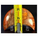 Petrified Wood Moon is a beautifully carved piece that captures ancient earth energy in a graceful moon shape.