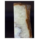 Agate Quartz with Slight Rainbows is a captivating natural stone that blends the grounding beauty of agate with the clarity and light play of quartz.