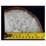 Agate Quartz with Slight Rainbows is a captivating natural stone that blends the grounding beauty of agate with the clarity and light play of quartz.