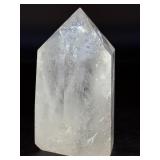 Rainbow Quartz Point Penetrator Crystal is a dazzling and dynamic formation where one quartz crystal naturally grows through another, creating a powerful penetrator shape.