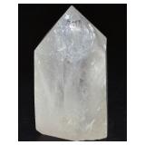 Rainbow Quartz Point Penetrator Crystal is a dazzling and dynamic formation where one quartz crystal naturally grows through another, creating a powerful penetrator shape.
