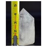 Rainbow Quartz Point Penetrator Crystal is a dazzling and dynamic formation where one quartz crystal naturally grows through another, creating a powerful penetrator shape.