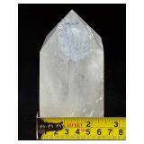 Rainbow Quartz Point Penetrator Crystal is a dazzling and dynamic formation where one quartz crystal naturally grows through another, creating a powerful penetrator shape.