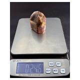 Super 7 Tower is a powerful and highly sought-after crystal carved into a polished towerthat showcases the natural blend of seven minerals: amethyst, clear quartz, smokyquartz, rutile, goethite, lepid